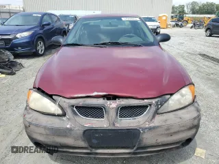 2004 Pontiac Grand Am SE z VIN 1G2NE52F34M596603, wystawiony jako Copart lot #57088665 z przebiegiem 213 295 mil mil oraz Szkoda całkowita • Salvage title. Historia ofert i sprzedaży dostępna na DreamBid. Obrazek 5.