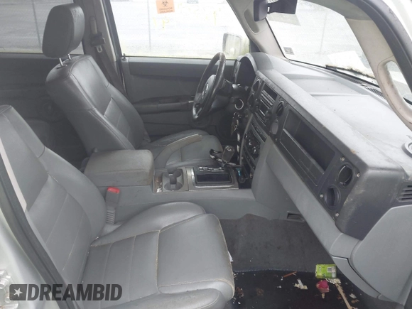 2007 Jeep Commander Sport z VIN 1J8HG48K47C501728, wystawiony jako IAAI lot #42509191 z przebiegiem Nie podano mil oraz . Historia ofert i sprzedaży dostępna na DreamBid. Obrazek 5.