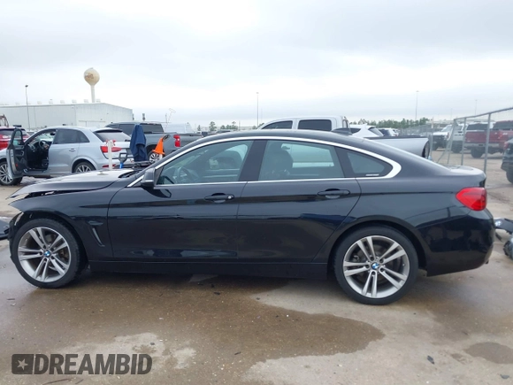 2019 BMW 4 Series 430i xDrive with VIN WBA4J3C50KBL09320, listed as a IAAI auction lot 41677736 with 73,277 mi miles. Bid and sale history available at carsss.com. Image 15.