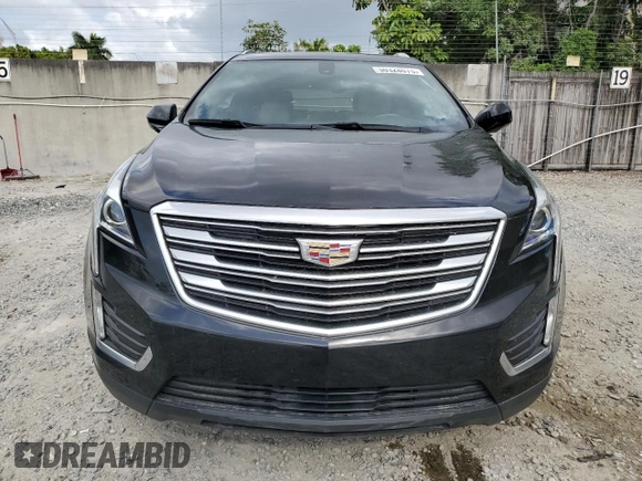2019 Cadillac XT5 FWD with VIN 1GYKNARS4KZ113480, listed as a Copart auction lot 50328075 with 73,064 mi miles and Non Repairable. Bid and sale history available at carsss.com. Image 5.