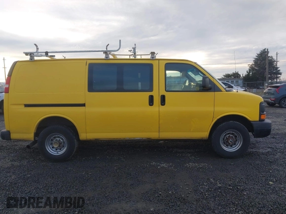 2014 Chevrolet Express Cargo Van with VIN 1GCWGFCA7E1150041, listed as a IAAI auction lot 41387426 with 185,480 mi miles. Bid and sale history available at carsss.com. Image 13.