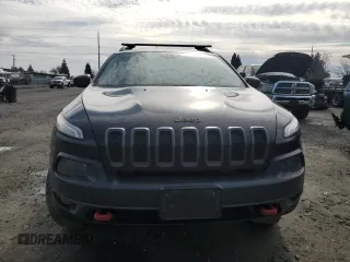 2014 Jeep Cherokee Trailhawk with VIN 1C4PJMBS9EW159993, listed as a Copart auction lot 46935105 with 128,140 mi miles and Salvage Title. Bid and sale history available at carsss.com. Image 5.