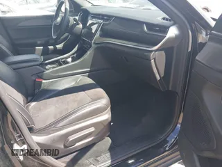 2023 Jeep Grand Cherokee Altitude with VIN 1C4RJJAG4P8817795, listed as a IAAI auction lot 42572709 with 49,468 mi miles and . Bid and sale history available at DreamBid. Image 5.