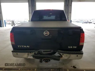 2006 Nissan Titan SE с VIN 1N6AA07B46N566356, выставлен на аукционе Copart как лот 54855565 с пробегом 221 595 миль миль и Списание • Salvage title. История ставок и продаж доступна на DreamBid. Изображение 6.