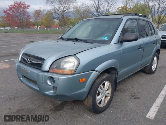 2009 Hyundai Tucson GLS with VIN KM8JM12B79U991776, listed as a IAAI auction lot 42088648 with 219,207 mi miles. Bid and sale history available at carsss.com. Image 2.