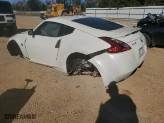 2018 Nissan 370Z Coupe NISMO with VIN JN1AZ4EH5JM572579, listed as a Copart auction lot 82122064 with 125,587 mi miles and Salvage Title. Bid and sale history available at carsss.com. Image 2.