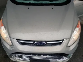2015 Ford C-Max Energi SEL with VIN 1FADP5CU5FL112752, listed as a Copart auction lot 41140014 with 129,824 mi miles. Bid and sale history available at carsss.com. Image 12.