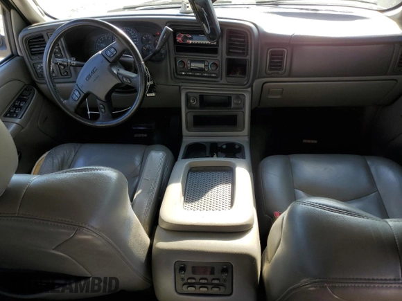 2004 GMC Yukon SLE with VIN 1GKEK13V24J236327, listed as a Copart auction lot 76896974 with 151,028 mi miles and Salvage Title. Bid and sale history available at carsss.com. Image 8.