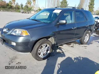 2006 Acura MDX Touring with VIN 2HNYD18726H533142, listed as a IAAI auction lot 42007839 with 216,910 mi miles. Bid and sale history available at carsss.com. Image 2.