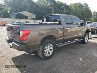 2017 Nissan Titan XD SL with VIN 1N6BA1F44HN510174, listed as a Copart auction lot 63245694 with 121,868 mi miles and Salvage Title. Bid and sale history available at carsss.com. Image 3.