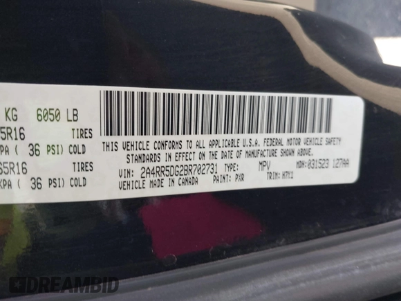2011 Chrysler Town & Country Touring with VIN 2A4RR5DG2BR702731, listed as a IAAI auction lot 42095661 with 202,968 mi miles and . Bid and sale history available at DreamBid. Image 9.