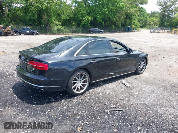 2015 Audi A8 3.0T with VIN WAU3GAFD6FN008993, listed as a IAAI auction lot 42239421 with 125,587 mi miles and . Bid and sale history available at DreamBid. Image 4.