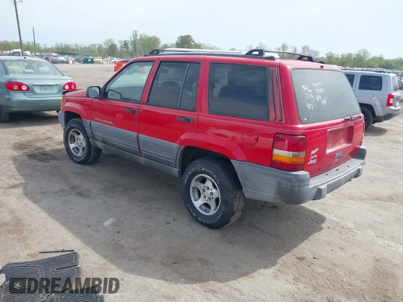 1996 Jeep Grand Cherokee Laredo with VIN 1J4FX58S4TC346218, listed as a IAAI auction lot 41943268 with 138,431 mi miles and . Bid and sale history available at DreamBid. Image 3.