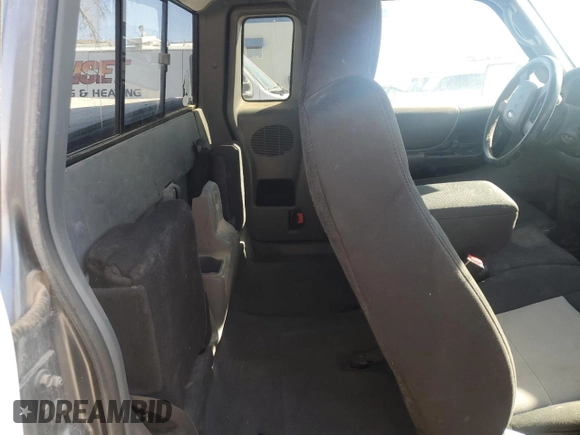 2009 Ford Ranger XLT with VIN 1FTZR45E69PA06141, listed as a Copart auction lot 43617815 with 102,986 mi miles and Salvage title. Bid and sale history available at DreamBid. Image 10.