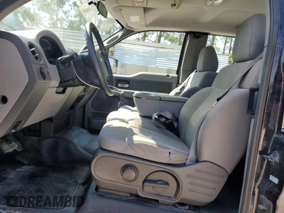 2007 Ford F-150 STX with VIN 1FTRX12W07FB12170, listed as a Copart auction lot 50452015 with 169,814 mi miles and Salvage title. Bid and sale history available at DreamBid. Image 7.