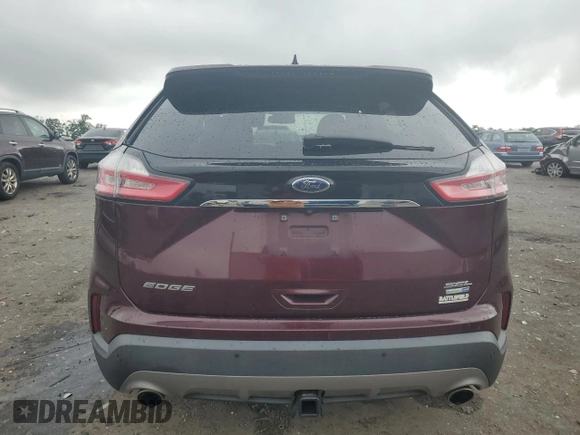 2019 Ford Edge SEL with VIN 2FMPK4J92KBB34891, listed as a Copart auction lot 60050945 with 104,942 mi miles and Salvage title. Bid and sale history available at DreamBid. Image 6.