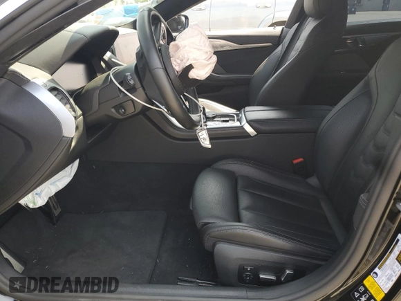 2020 BMW 8 Series M850i with VIN WBAGV8C01LCE50737, listed as a Copart auction lot 58318665 with Not provided miles and Salvage title. Bid and sale history available at DreamBid. Image 7.