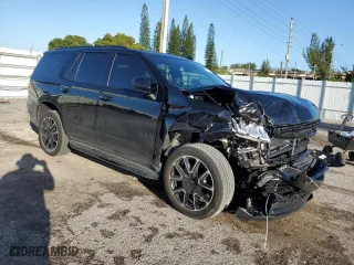 2023 Chevrolet Tahoe RST with VIN 1GNSCRKDXPR483465, listed as a Copart auction lot 77744604 with 11,078 mi miles and Salvage Title. Bid and sale history available at carsss.com. Image 4.