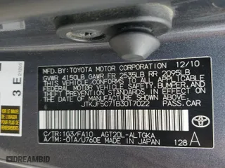 2011 Scion tC with VIN JTKJF5C71B3017022, listed as a Copart auction lot 52859865 with 220,603 mi miles and Salvage Title. Bid and sale history available at carsss.com. Image 12.