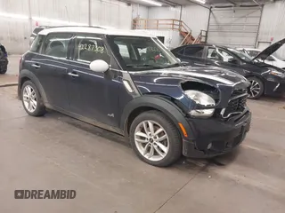 2014 MINI Countryman S with VIN WMWZC5C56EWP38017, listed as a IAAI auction lot 42287308 with 151,780 mi miles and . Bid and sale history available at DreamBid. Image 1.