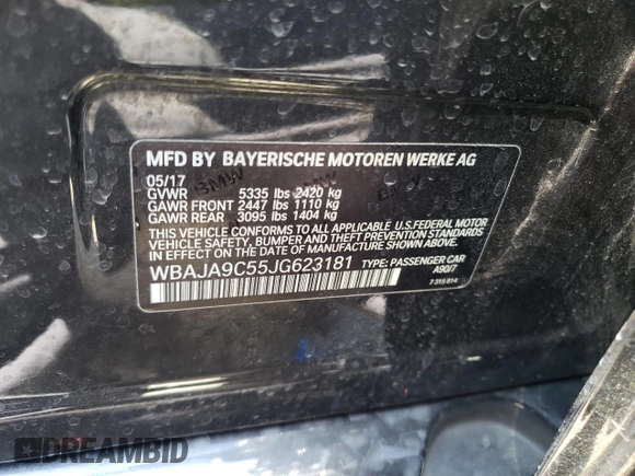 2018 BMW 5 Series 530e with VIN WBAJA9C55JG623181, listed as a Copart auction lot 61593983 with 63,577 mi miles and . Bid and sale history available at DreamBid. Image 12.