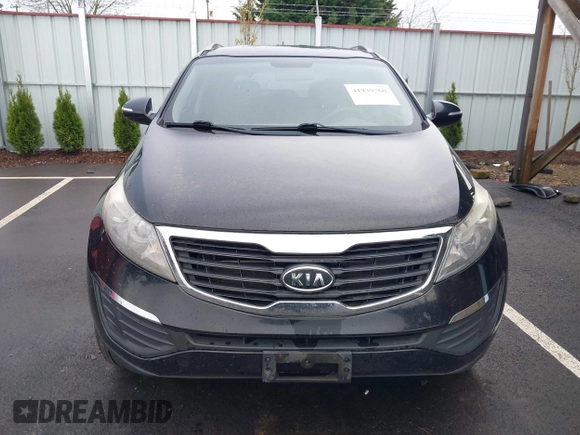 2011 Kia Sportage LX with VIN KNDPB3A26B7100916, listed as a IAAI auction lot 41939760 with 205,890 mi miles and . Bid and sale history available at carsss.com. Image 6.
