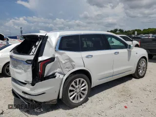 2020 Cadillac XT6 FWD Premium Luxury z VIN 1GYKPCRS7LZ235645, wystawiony jako Copart lot #58977995 z przebiegiem 42 504 mil mil oraz Nie do naprawy • Non repairable. Historia ofert i sprzedaży dostępna na DreamBid. Obrazek 3.