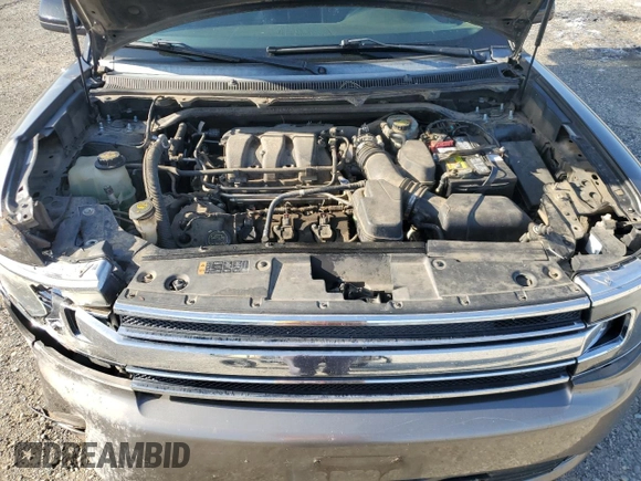 2014 Ford Flex SEL z VIN 2FMGK5C86EBD41038, wystawiony jako Copart lot #55609235 z przebiegiem 157 934 mil mil oraz Szkoda całkowita • Salvage title. Historia ofert i sprzedaży dostępna na DreamBid. Obrazek 12.