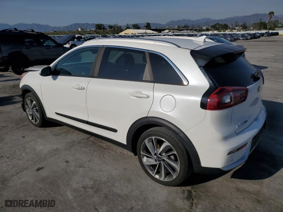 2017 Kia Niro Touring with VIN KNDCE3LC2H5079191, listed as a Copart auction lot 50053415 with 123,138 mi miles and Salvage Title. Bid and sale history available at carsss.com. Image 2.