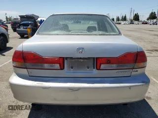 2002 Honda Accord EX z VIN 1HGCG16582A001090, wystawiony jako Copart lot #58244785 z przebiegiem 99 158 mil mil oraz Szkoda całkowita • Salvage title. Historia ofert i sprzedaży dostępna na DreamBid. Obrazek 6.