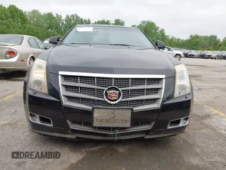 2009 Cadillac CTS AWD w/1SB with VIN 1G6DT57V290165006, listed as a IAAI auction lot 42144947 with 162,969 mi miles. Bid and sale history available at carsss.com. Image 6.