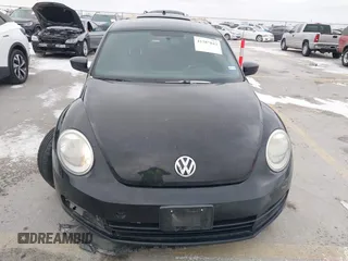 2013 Volkswagen Beetle Entry with VIN 3VWFP7AT8DM644840, listed as a IAAI auction lot 41387843 with 195,597 mi miles and . Bid and sale history available at DreamBid. Image 12.