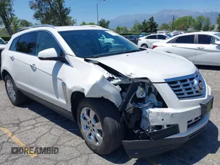 2016 Cadillac SRX Luxury Collection z VIN 3GYFNBE36GS571905, wystawiony jako IAAI lot #42315553 z przebiegiem 66 014 mil mil oraz . Historia ofert i sprzedaży dostępna na DreamBid. Obrazek 1.