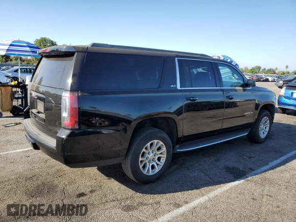 2018 GMC Yukon XL SLT with VIN 1GKS1GKC6JR305624, listed as a Copart auction lot 71157044 with 283,155 mi miles and Salvage Title. Bid and sale history available at carsss.com. Image 3.