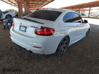 2017 BMW 2 Series M240i with VIN WBA2G1C39HV639568, listed as a IAAI auction lot 41888789 with 65,998 mi miles. Bid and sale history available at carsss.com. Image 4.