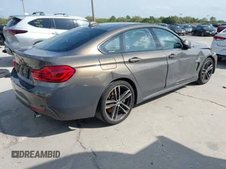 2018 BMW 4 Series 440i with VIN WBA4J5C54JBF07315, listed as a IAAI auction lot 41738540 with 74,577 mi miles and . Bid and sale history available at DreamBid. Image 4.