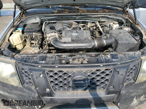 2010 Nissan Xterra SE z VIN 5N1AN0NW5AC509239, wystawiony jako Copart lot #59434865 z przebiegiem 106 209 mil mil oraz Czysty tytuł • Clean title. Historia ofert i sprzedaży dostępna na DreamBid. Obrazek 13.