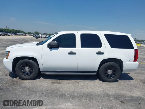 2011 Chevrolet Tahoe Commercial with VIN 1GNLC2E02BR325621, listed as a IAAI auction lot 41866389 with 167,693 mi miles and . Bid and sale history available at DreamBid. Image 14.