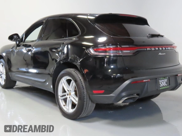 2023 Porsche Macan with VIN WP1AA2A50PLB01554, listed as a Copart auction lot 61992765 with 31,549 mi miles and Salvage title. Bid and sale history available at DreamBid. Image 4.