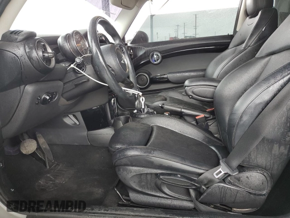 2014 MINI Hardtop S with VIN WMWXM7C57ET985421, listed as a Copart auction lot 49443335 with 76,168 mi miles and Salvage Title. Bid and sale history available at DreamBid. Image 7.
