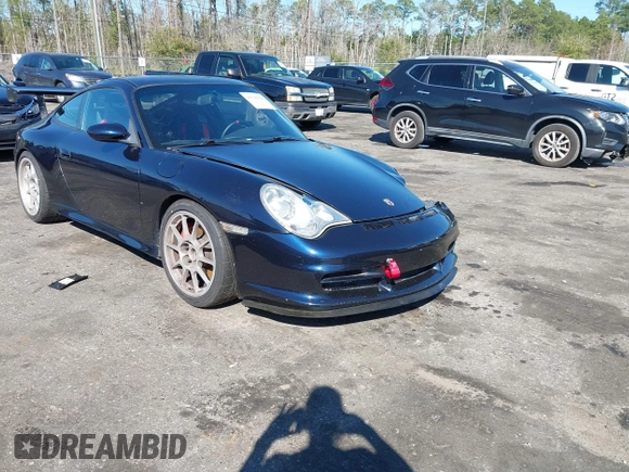 2004 Porsche 911 z VIN WP0AC29954S692825, wystawiony jako IAAI lot #41781530 z przebiegiem 28 942 mil mil oraz . Historia ofert i sprzedaży dostępna na DreamBid. Obrazek 1.