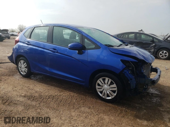 2015 Honda Fit LX с VIN 3HGGK5H57FM725785, выставлен на аукционе Copart как лот 54344325 с пробегом 76 849 миль миль и Списание • Salvage title. История ставок и продаж доступна на DreamBid. Изображение 4.