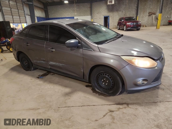 2012 Ford Focus SE with VIN 1FAHP3F28CL208855, listed as a Copart auction lot 63766165 with 168,183 mi miles and Salvage title. Bid and sale history available at DreamBid. Image 4.