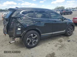 2017 Honda CR-V Touring with VIN 5J6RW1H93HL003929, listed as a Copart auction lot 53295705 with 67,097 mi miles and Salvage Title. Bid and sale history available at carsss.com. Image 3.