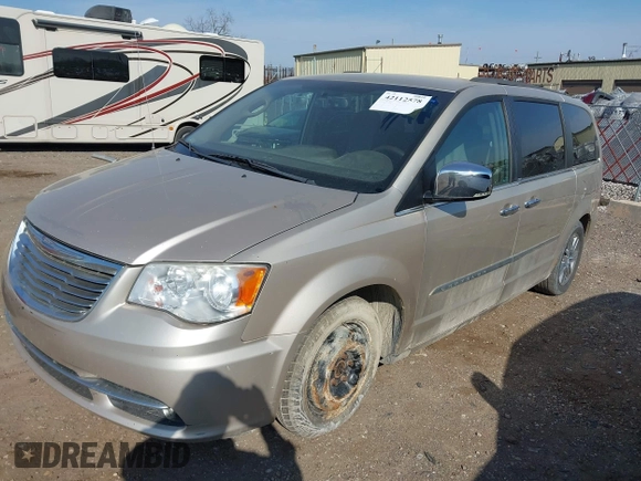 2012 Chrysler Town & Country Touring-L with VIN 2C4RC1CG0CR340692, listed as a IAAI auction lot 42112578 with 200,681 mi miles. Bid and sale history available at carsss.com. Image 2.