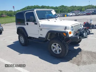 2002 Jeep Wrangler X z VIN 1J4FA39S32P721589, wystawiony jako IAAI lot #42228764 z przebiegiem 173 812 mil mil oraz . Historia ofert i sprzedaży dostępna na DreamBid. Obrazek 1.