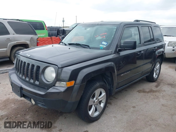 2014 Jeep Patriot Latitude with VIN 1C4NJRFB3ED810819, listed as a IAAI auction lot 41994129 with 145,733 mi miles and . Bid and sale history available at carsss.com. Image 2.