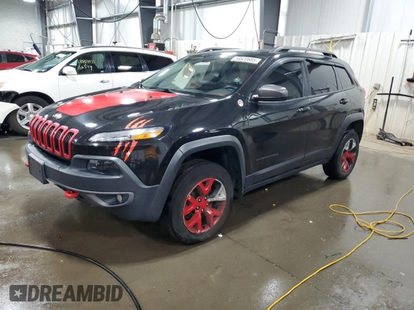 2015 Jeep Cherokee Trailhawk with VIN 1C4PJMBS5FW587545, listed as a Copart auction lot 58820685 with 136,755 mi miles and Salvage title. Bid and sale history available at DreamBid. Image 1.