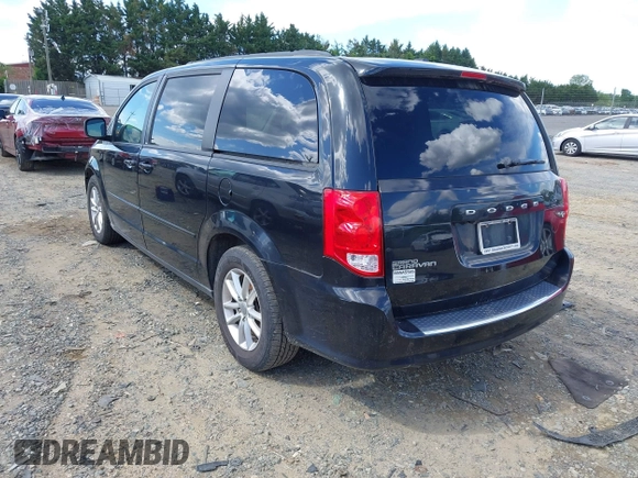 2013 Dodge Grand Caravan SXT with VIN 2C4RDGCG9DR563072, listed as a IAAI auction lot 42179166 with 211,008 mi miles and . Bid and sale history available at DreamBid. Image 3.