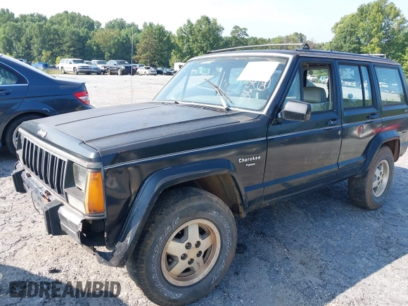 1990 Jeep Cherokee with VIN 1J4FJ38L1LL100497, listed as a IAAI auction lot 37253812 with 214,943 mi miles and . Bid and sale history available at DreamBid. Image 2.